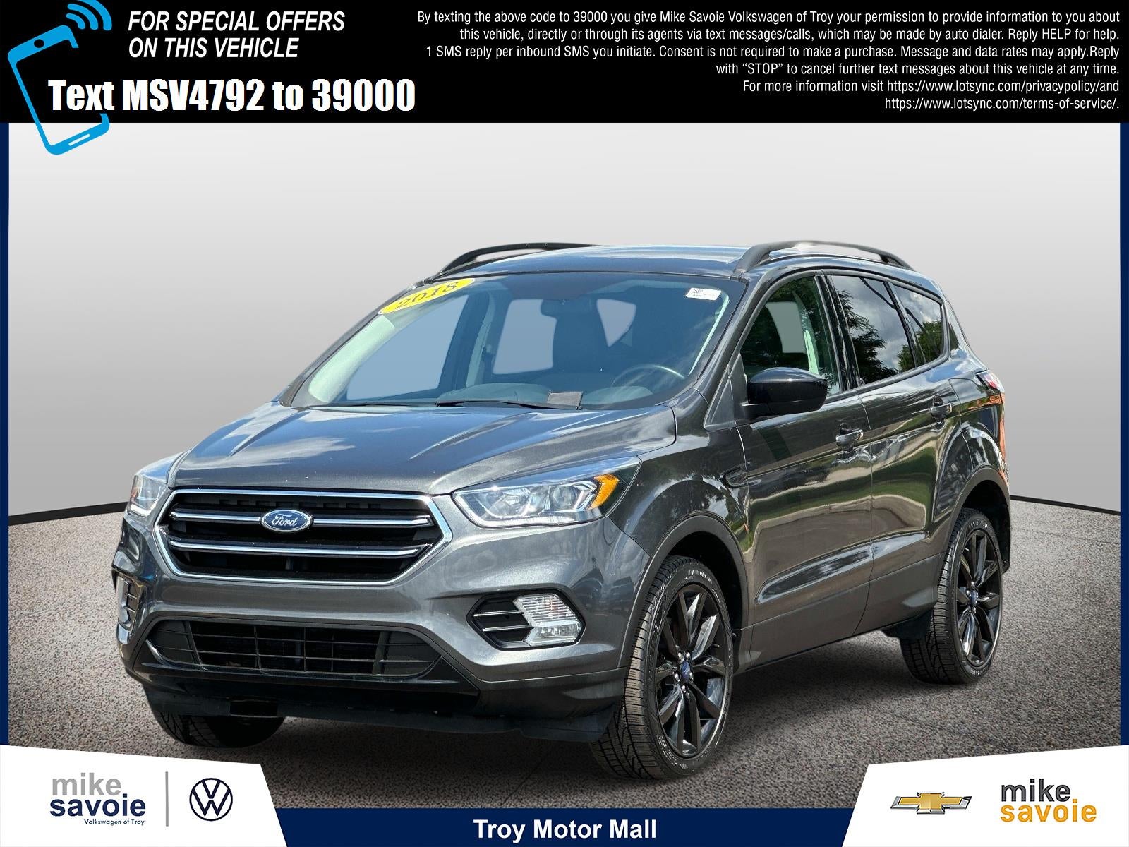 2018 Ford Escape SE 4WD in Black — front three-quarter view
